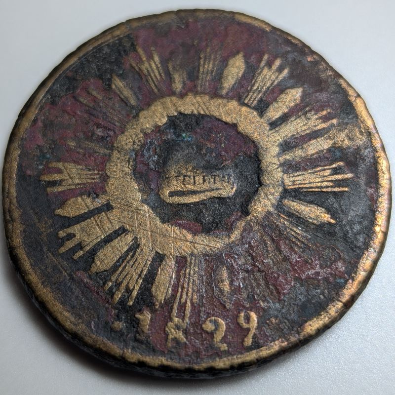 The sol side of the 1829 tlaco, with the liberty Phrygian cap