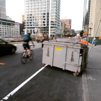 The famous Folsom Street dumpster lane at 1st St.