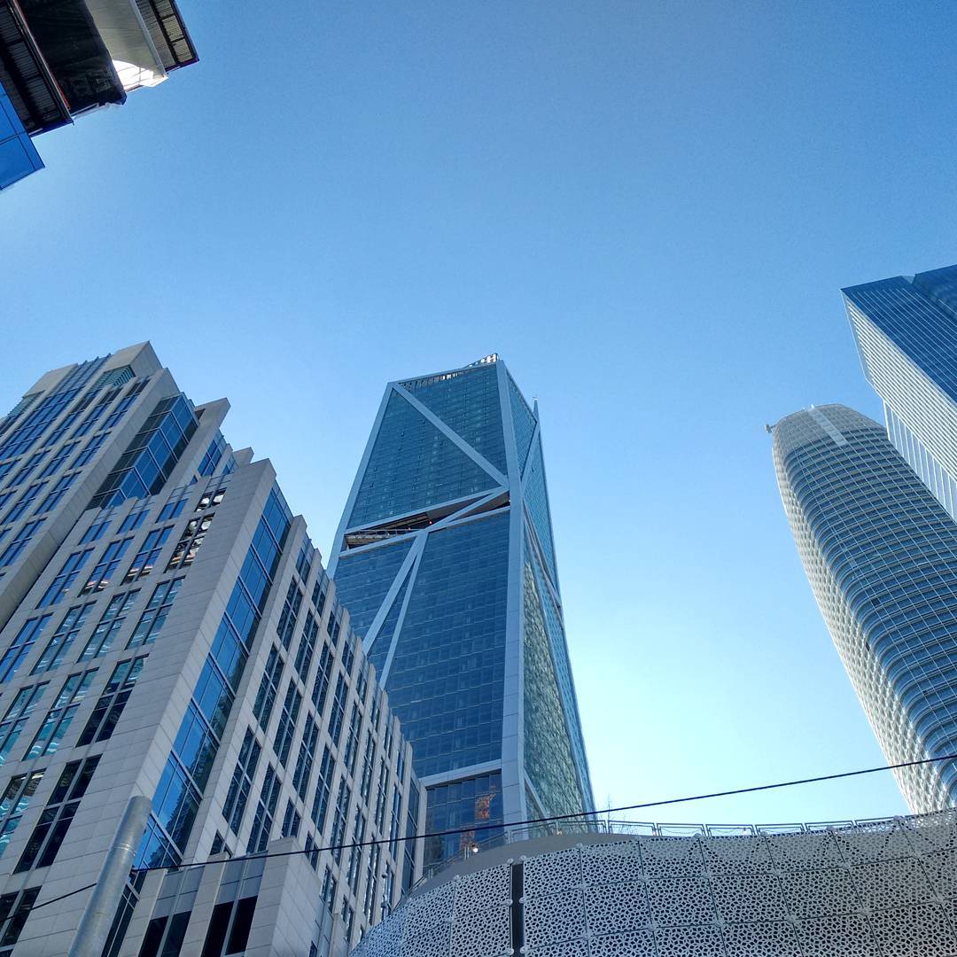 Looking up at a blue January sky from San Francisco’s glass and metal canyons.