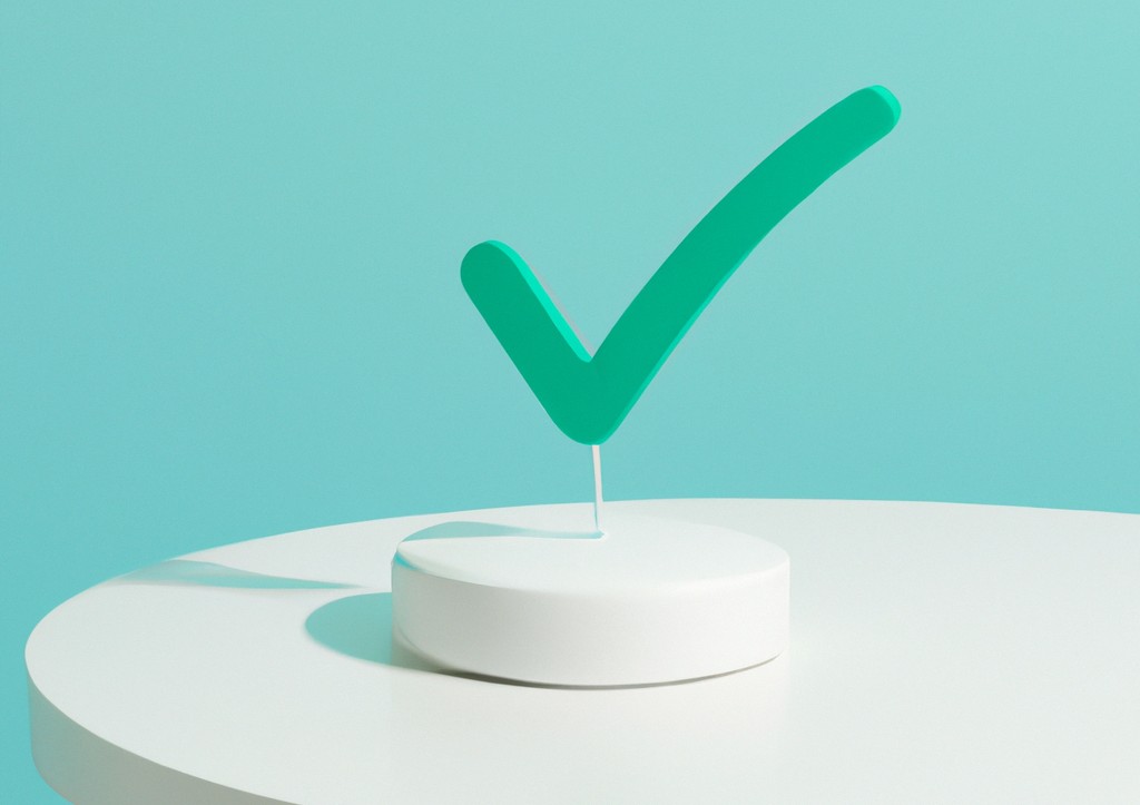 Green Check Mark on a White Table